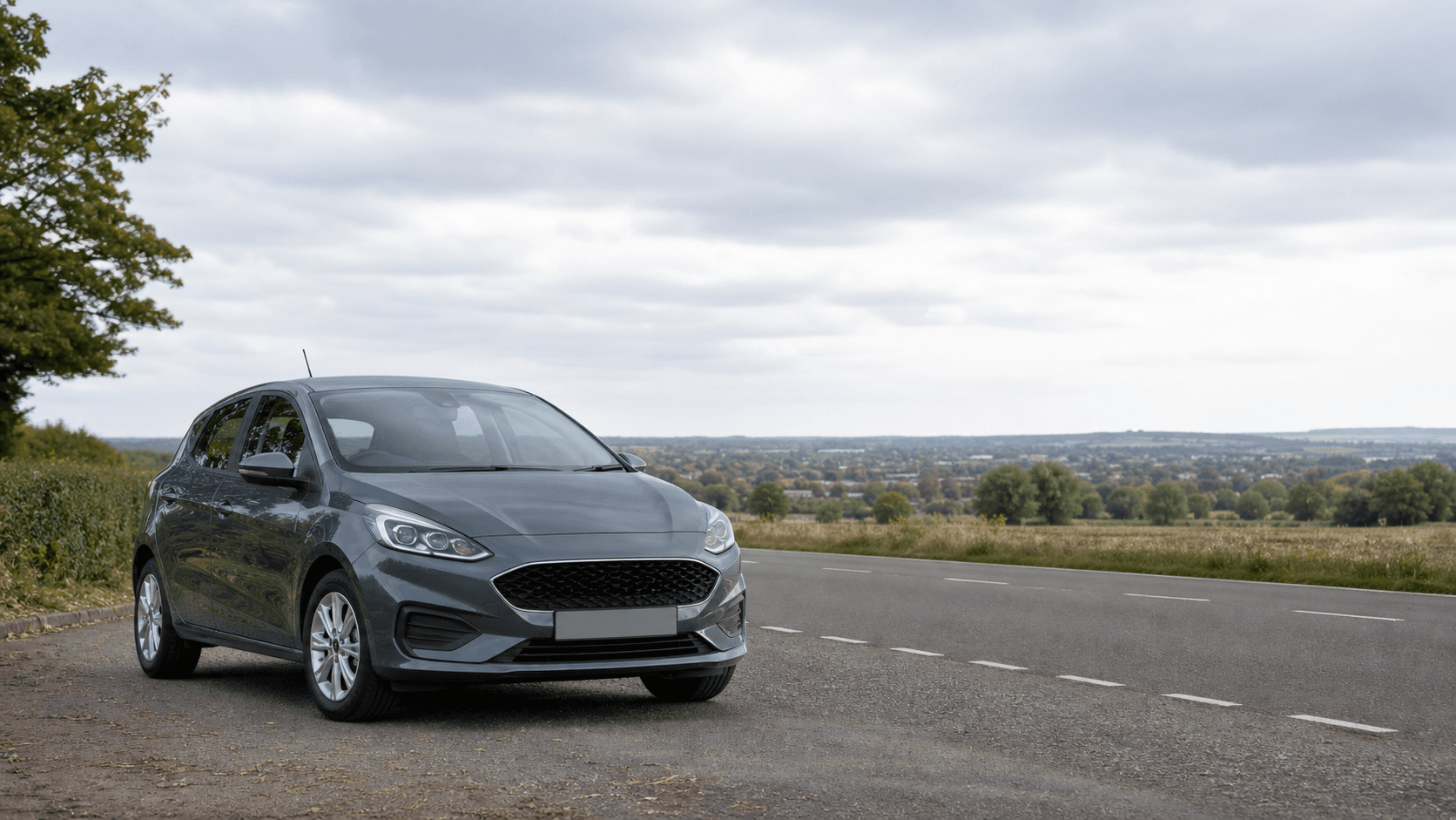 Compact hire car ready for practical travel around Mansfield